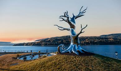 The sculpture TRE along the industrial promenade in Notodden.