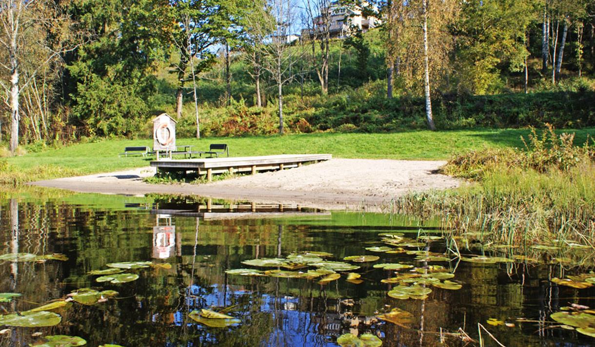 Falkumlia bathing area with sandy beach and jetty