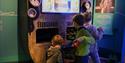 children playing at DuVerden maritime museum + science center in Porsgrunn